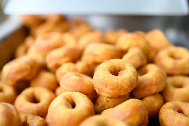 Fresh mini donuts produced during MP3 machine testing