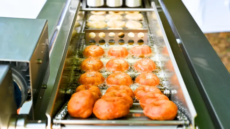 Watch the mini donut machine demonstration